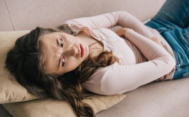 woman suffering from severe menstrual pain